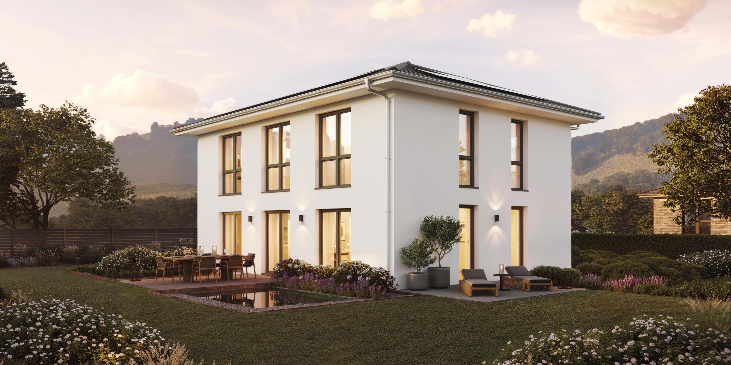 Seitenansicht einer Stadtvilla mit Putzfassade von Viebrockhaus - Das Haus heißt V9 II