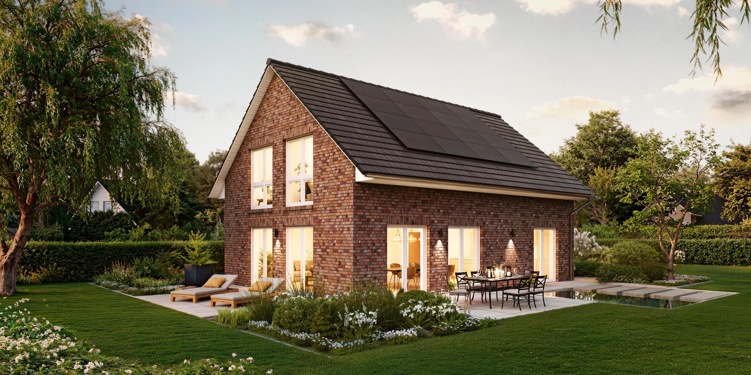Seitenansicht eines Einfamilienhauses mit grauen Klinkersteinen. Das Einfamilienhaus ist das V1 von Viebrockhaus