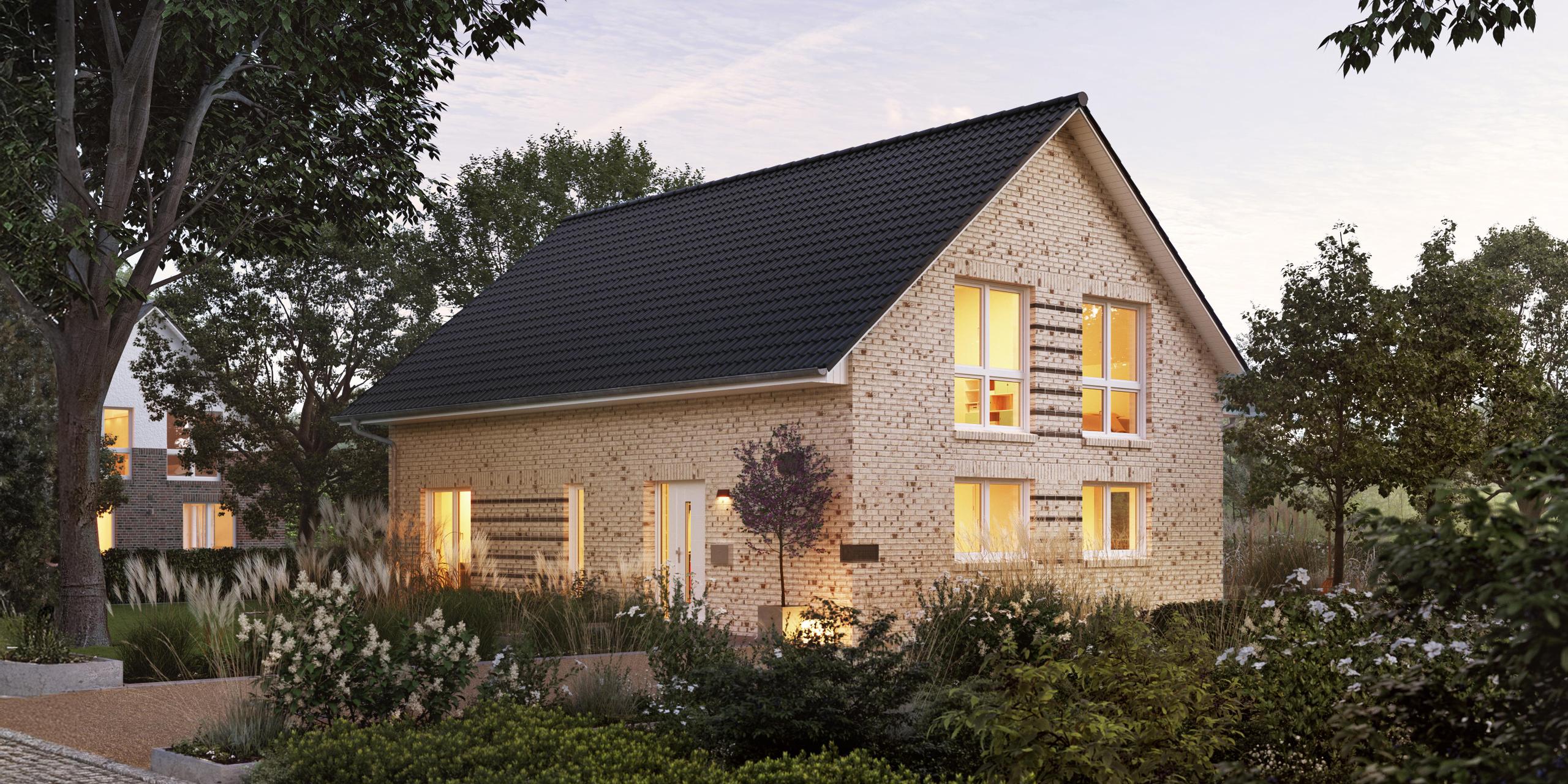 Frontansicht eines Zweifamilienhauses in der Dämmerung mit weißem Klinkerstein - Maxime 380 ELW von Viebrockhaus