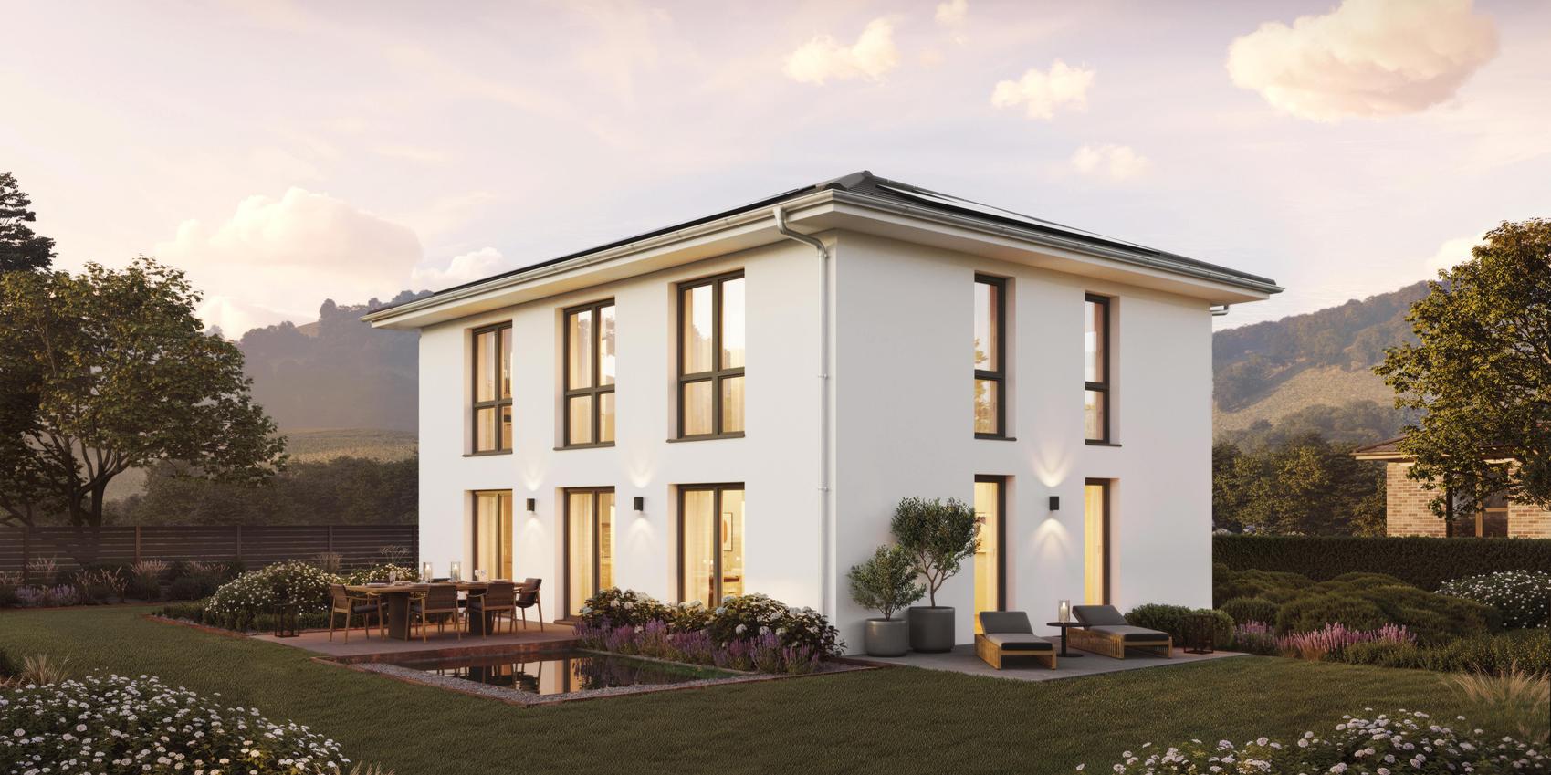 Seitenansicht einer Stadtvilla mit Putzfassade von Viebrockhaus - Das Haus heißt V9 II