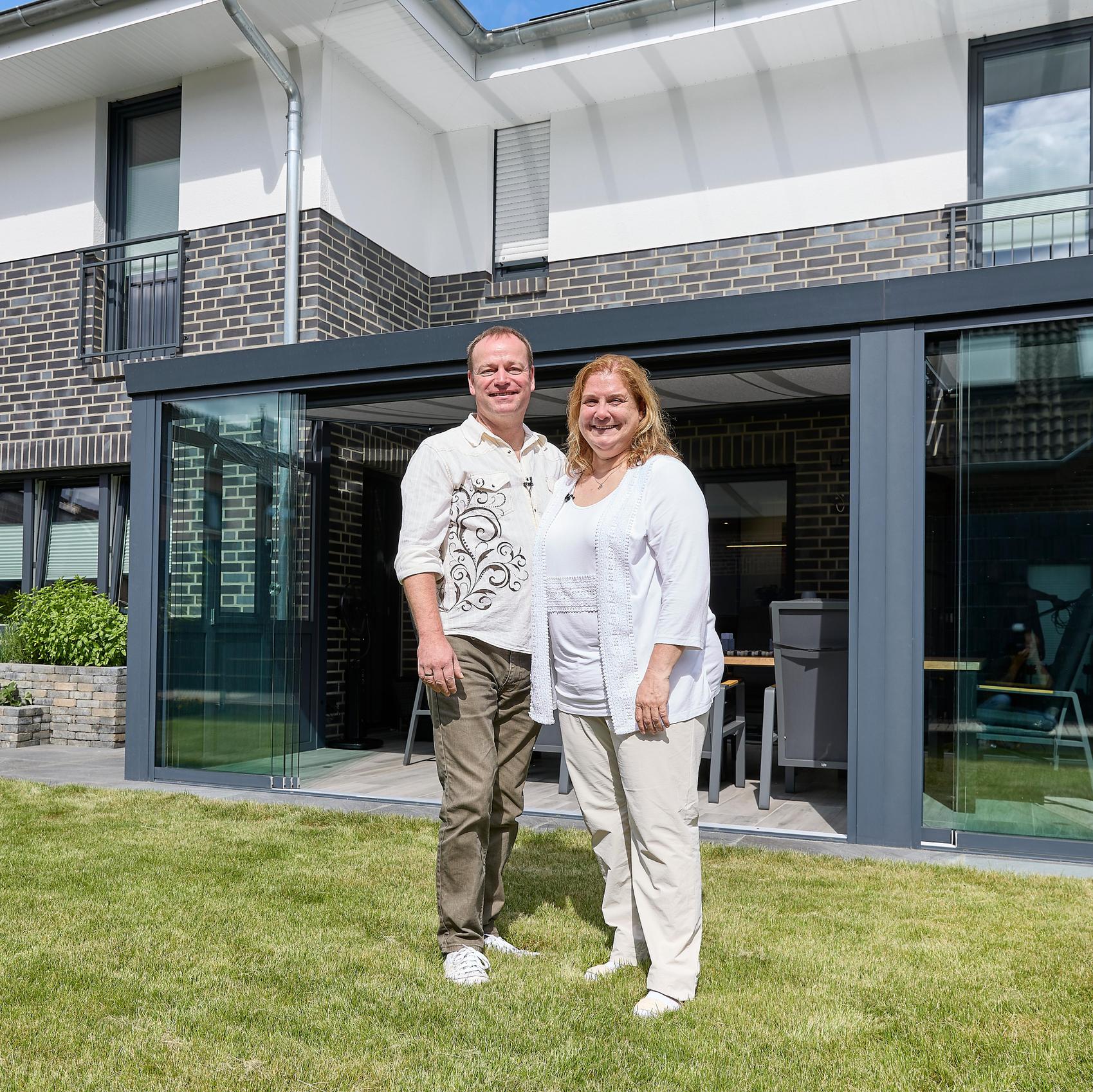 Maxime 800 Bauherrenfamilie mit Hund