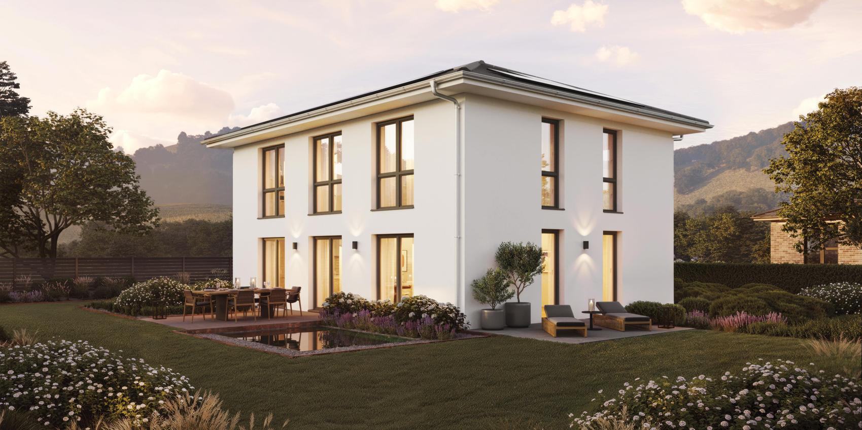 Seitenansicht einer Stadtvilla mit Putzfassade von Viebrockhaus - Das Haus heißt V9 II