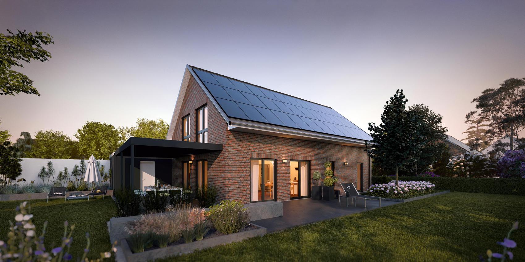 Seitenansicht des Einfamilienhauses V2 von Viebrockhaus. Es handelt sich um ein Klinkerhaus mit einer überdachten Terrasse