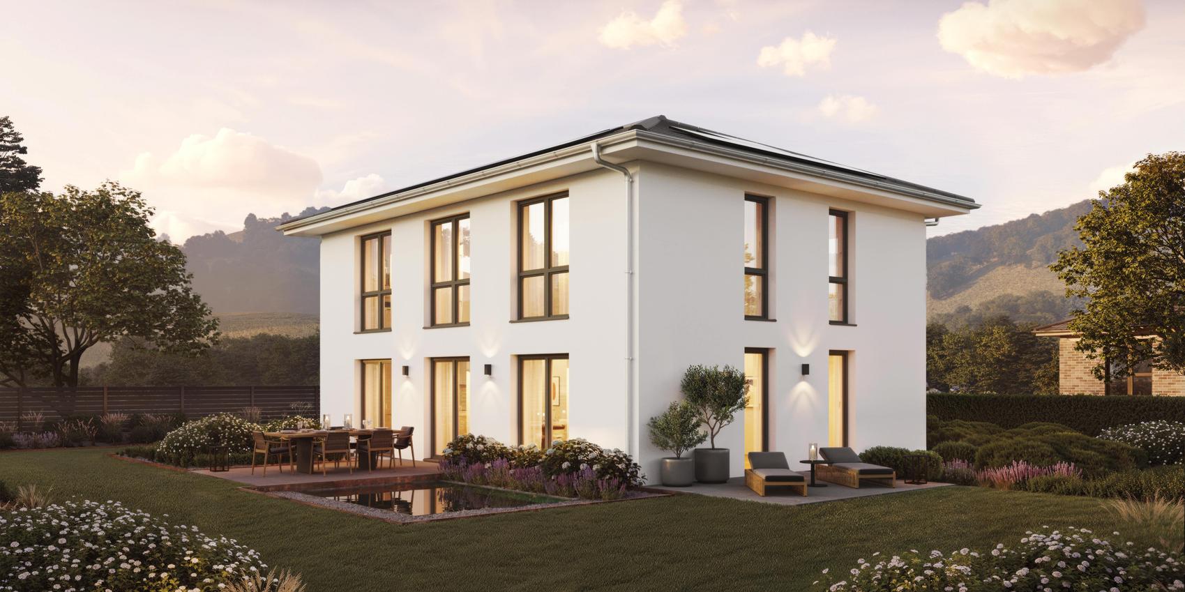 Seitenansicht einer Stadtvilla mit Putzfassade von Viebrockhaus - Das Haus heißt V9 II