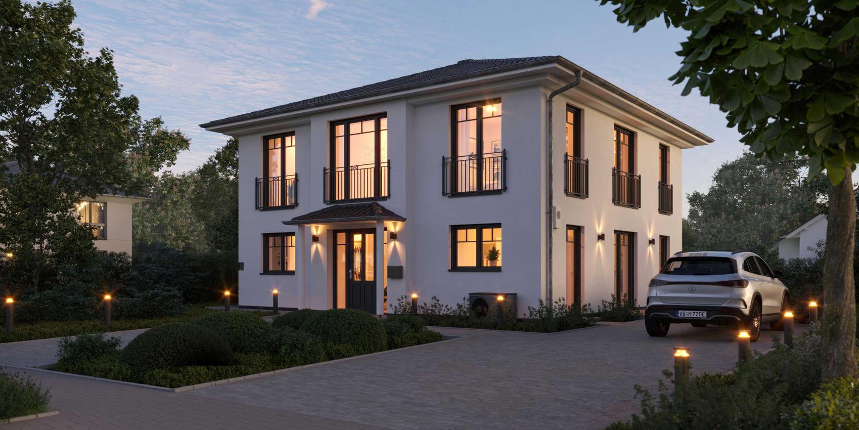 Modernes, erleuchtetes Einfamilienhaus von Viebrockhaus in der Abenddämmerung.