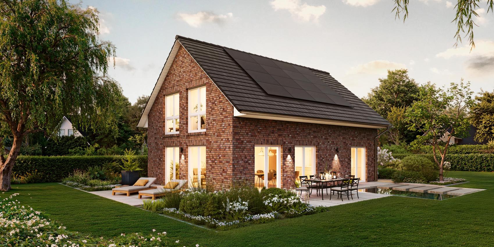 Seitenansicht eines Einfamilienhauses mit grauen Klinkersteinen. Das Einfamilienhaus ist das V1 von Viebrockhaus