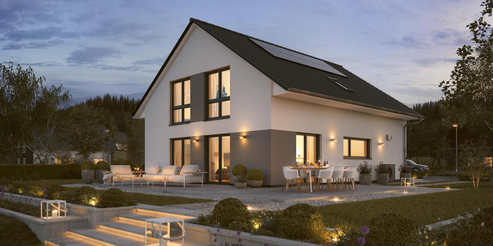 Ansicht auf ein Einfamilienhaus weiß und grau verputzt mit Terrasse aus dem Garten. Hierbei handelt es sich um das Maxime 420 von Viebrockhaus